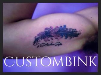 Pluma Acuarela tatuaje realizado por B-Ink Tattoo