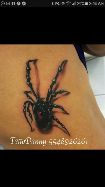 Spider tatuaje realizado por TattoDanny