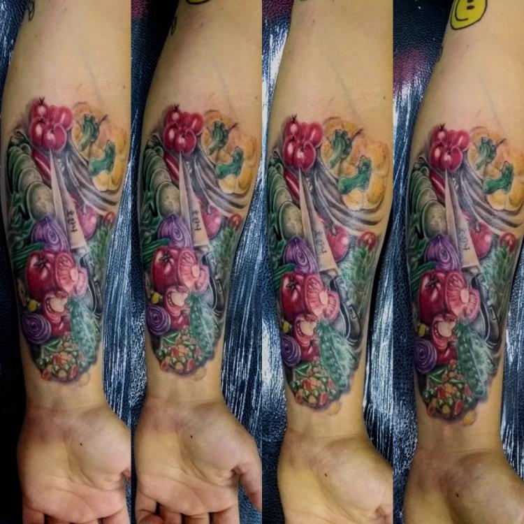 Hiper realismo color  tatuaje realizado por West