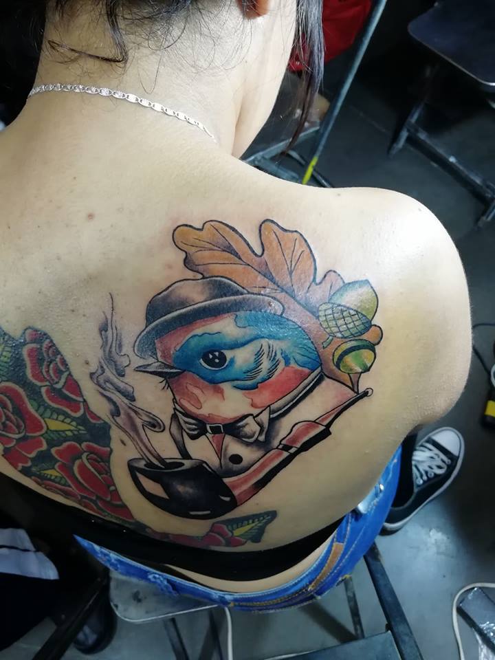 Ave y pipa tatuaje realizado por Juliio Tatuajes