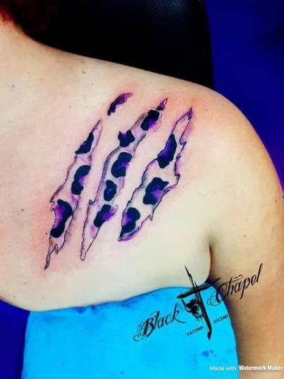 zarpazo tatuaje realizado por Jonathan Aguirre