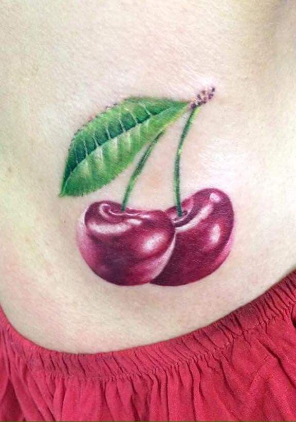 Cherrys tatuaje realizado por Alejandro Hernández (Piolink)