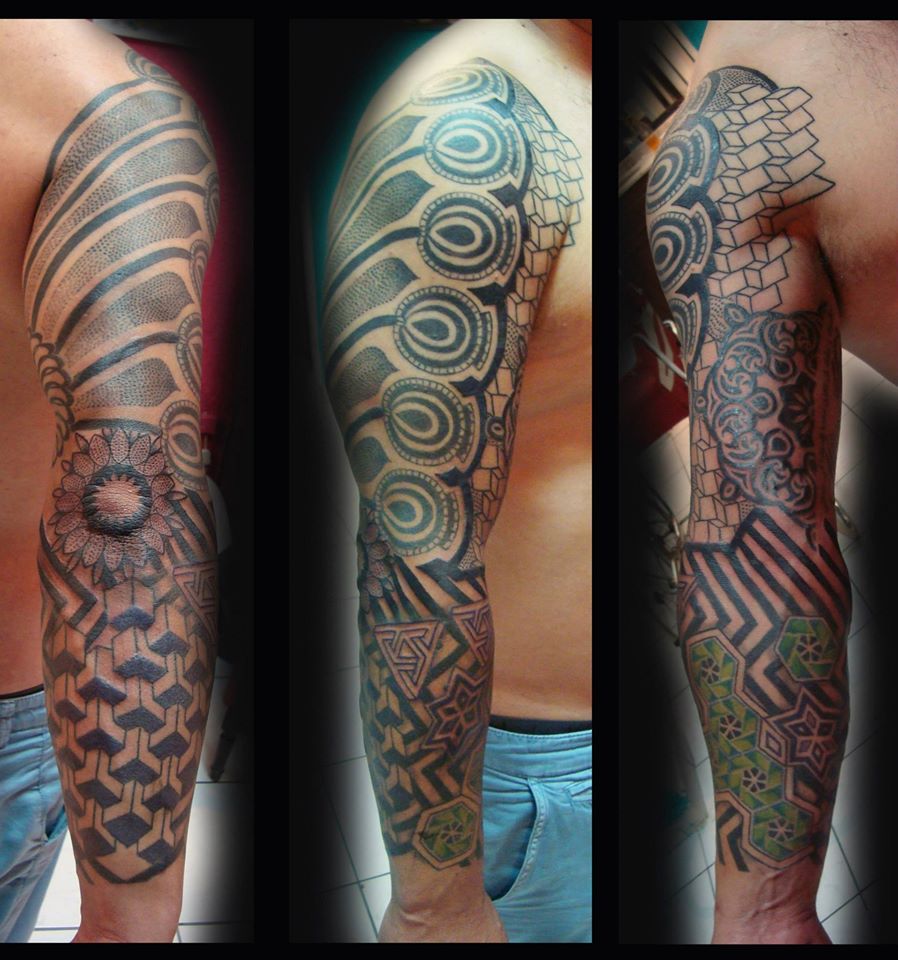 tatuaje en todo el brazo tatuaje realizado por Rene pacheco