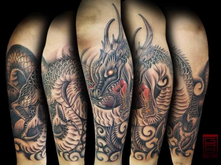 Dragon de las nubes  tatuaje realizado por Gart
