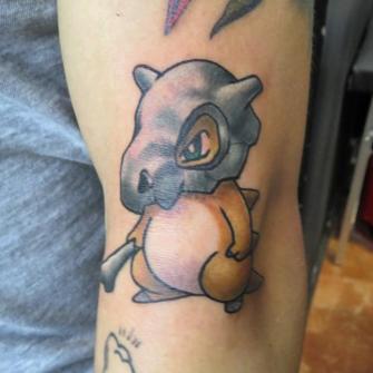 Pokemon tatuaje realizado por Totentanz Cabral